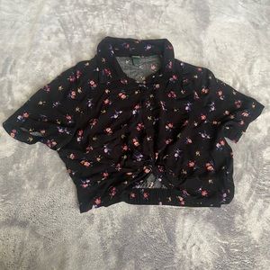 Small black top with floral design from wild fable